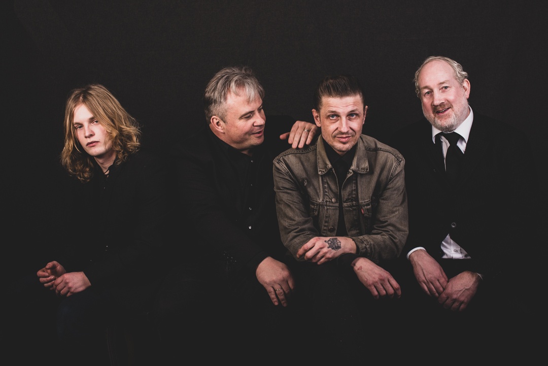 a person playing a guitar